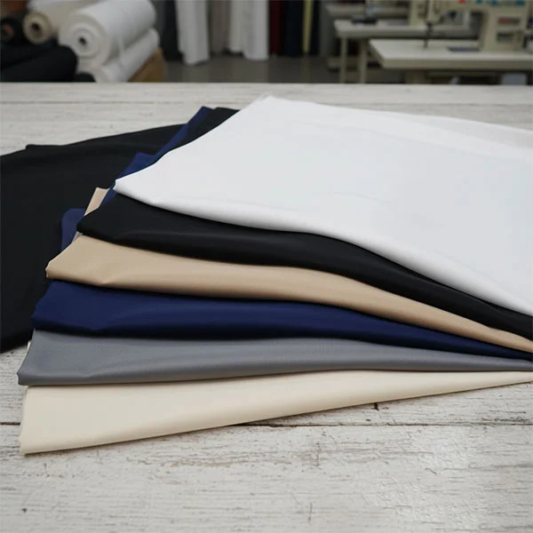 ভিসকস ক্যালেন্ডারযুক্ত আস্তরণের ফ্যাব্রিক ভিসকস ক্যালেন্ডারযুক্ত আস্তরণের ফ্যাব্রিক